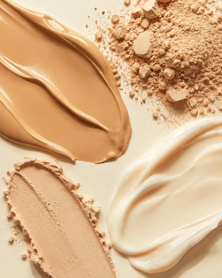 Close-up of cream and powder cosmetic textures